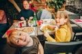 Happy family eating hamburger with french fries and pizza Royalty Free Stock Photo