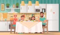 Happy family eating in the kitchen. Father, mother, son and daughter have breakfast at the table at home Royalty Free Stock Photo