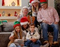 Family and elderly grandparents celebrating Christmas