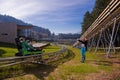 Happy family enjoying alpine coaster