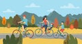 Happy family enjoying bike ride and autumn nature together, cyclists in helmets travel Royalty Free Stock Photo