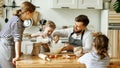 Happy family enjoying cooking together Royalty Free Stock Photo