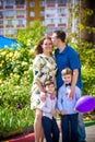 Happy family enjoying life together at meadow outdoor Royalty Free Stock Photo