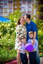 Happy family enjoying life together at meadow outdoor Royalty Free Stock Photo