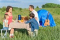 Happy family enjoying lunch outdoors Royalty Free Stock Photo