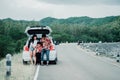 Happy family enjoying road trip and summer vacation with mountain background Royalty Free Stock Photo