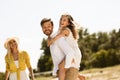 Happy Family Enjoying Summer Day Together, Father Carrying Daughter Outdoors Royalty Free Stock Photo
