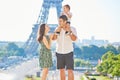 Happy family enjoying their vacation in Paris, France