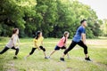 Happy family exercising  together at the park Royalty Free Stock Photo