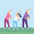 Happy family exercising together at the park Royalty Free Stock Photo