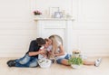 Happy Family Expecting New Baby. Pregnant Woman with Husband kiss the little son. Royalty Free Stock Photo