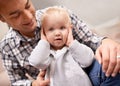 Happy family, father and baby girl in home with love, playing and care of parent in living room. Dad, daughter or relax Royalty Free Stock Photo