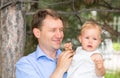 Happy family. Father carrying child girl outdoor enjoy nature. Portrait dad and daughter. Positive human emotions, feelings, joy. Royalty Free Stock Photo