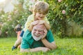 Happy family father and child on meadow with a kite in the summer on green grass. Grandfather and son. Cute boy with dad Royalty Free Stock Photo