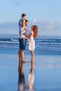 Happy family - father, mother, baby son on sea beach holiday Royalty Free Stock Photo