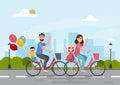 Happy family. father, mother, boy and girl riding on a bicycle together Royalty Free Stock Photo