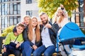 Happy family - father, mother and children having fun together on playground. Royalty Free Stock Photo