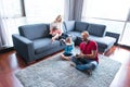 Happy family playing a video game Royalty Free Stock Photo