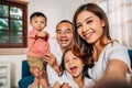Happy family father mother and children taking selfie photos Royalty Free Stock Photo