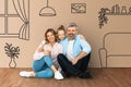 Happy family posing at their new house, collage Royalty Free Stock Photo