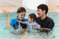 happy family. father and mother with small daughter in swimming pool Royalty Free Stock Photo