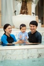 happy family. father and mother with small daughter in swimming pool Royalty Free Stock Photo