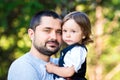 Happy family and father`s day. child daughter kissing and hugging dad Royalty Free Stock Photo