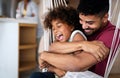 Happy family and father`s day. Child daughter kissing and hugging with dad. Royalty Free Stock Photo