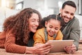 Happy family on floor with tablet, kid and movies, streaming service for child development video for education. Mom, dad Royalty Free Stock Photo