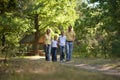 Happy family of four in autumn park walking Royalty Free Stock Photo