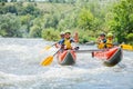 Happy family of four on the catamaran Royalty Free Stock Photo