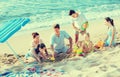 Happy family with four children playing on beach Royalty Free Stock Photo