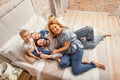 Happy family of four at home Royalty Free Stock Photo