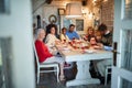 Happy Family and friends at Christmas dinner.Family People having Christmas dinner