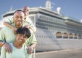 Happy Family in Front of Cruise Ship Royalty Free Stock Photo