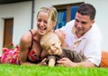 Happy family in front of the house Royalty Free Stock Photo