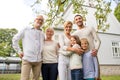 Happy family in front of house outdoors Royalty Free Stock Photo