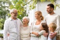 Happy family in front of house outdoors Royalty Free Stock Photo