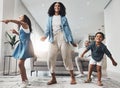 Happy family, fun and dance in a living room by mother and children playing, bonding and happy in their home. Kids Royalty Free Stock Photo