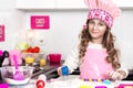 Happy family funny child prepares dough, bake cakes in the kitchen. Royalty Free Stock Photo