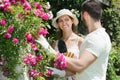 Happy family in garden flowers