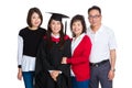 Happy family gathered together with graduate stude