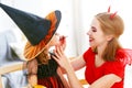 Happy family getting ready for halloween make make-up Royalty Free Stock Photo