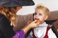 Happy family getting ready for halloween make make-up Royalty Free Stock Photo