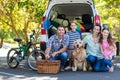 Happy family getting ready for road trip Royalty Free Stock Photo