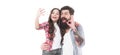 Happy family girl child and bearded man take selfie with mobile camera phone isolated on white, OK Royalty Free Stock Photo