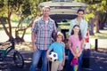 Happy family going for a camping in the park Royalty Free Stock Photo