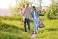 Happy family going on picnic in park Royalty Free Stock Photo