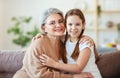 Happy family grandma and granddaughter hugging