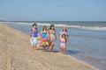 Happy family. Grandmother, grandfather, Mother, youngest daughter and an seventeen-year-old daughter with Down syndrome. Royalty Free Stock Photo